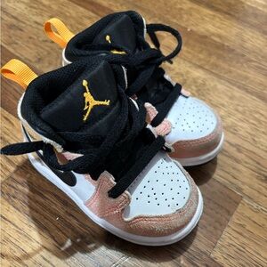 Black and orange Jordan’s